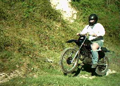 up hill jump - uphill jump, with a little hole in my jeans.lol after hitting a tree in a crash