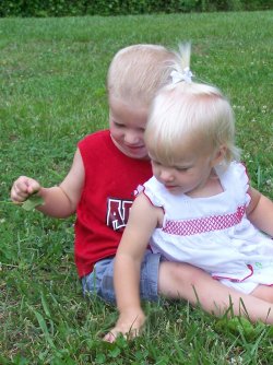 my babies - playing in the grass together.