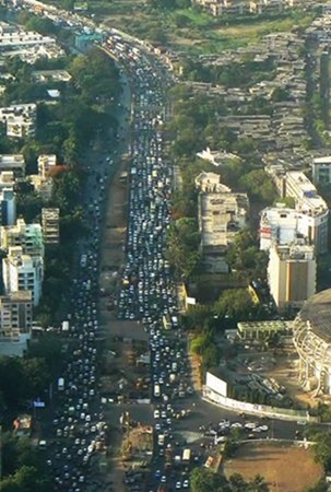 Mumbai Traffic Mumbai Traffic - Travel Time equals Distance multiplied by Traffic, plus 100 minutes, divided by Frustration.