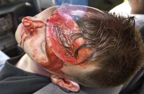 Cool makeup but still not too realistic - Pretty cool head gash but the blood is pretty much dried up when this photo was taken..