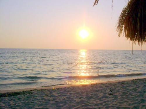 sunset on the beach - I love watching the sunset on the beach especially when you're swimming. The sun is so different everyday when it set. I also want ti watch the sunrise but I don't wake up early.