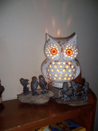 Owl Light and Pewter Collection - Photo of Ceramic Owl Light and six minature pewter owls from my collection.