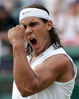 Rafael Nadal - Rafael Nadal celebrating with a fist pump after a good shot.