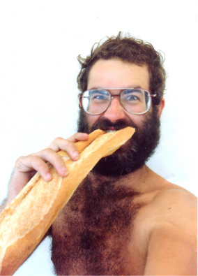 Can you stand eating plain bread? - A picture of a guy munching on bread, a baguette. Taken with permission from http://farm1.static.flickr.com/36/86414872_3f3a5f9982.jpg?v=0 .