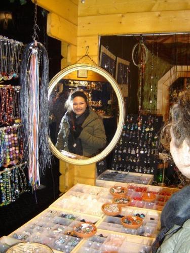 Berlin jewlery stand - This is me in Berlin at a jewelery market. I loved the mirror reflection. The jewelery was beautiful too.