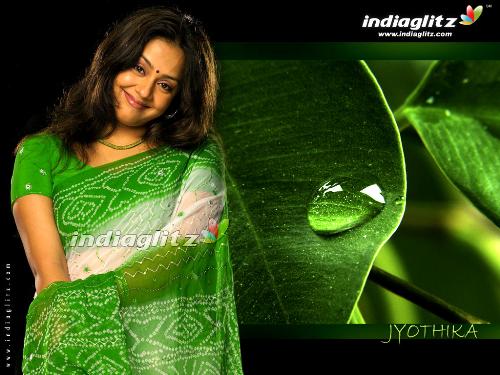 Jothika in rain - This is the photo of the famous actress in south India called Jothika.She has drenched herself in rain. Jothika in rain - This is the photo of the famous actress in south India called Jothika.She has drenched herself in rain.