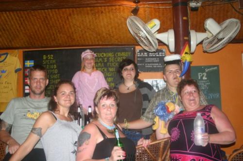 Alex of Sweden - Celebrating his graduation - Since Alex was in Koh Samui, Thailand with his family for a holiday, he could not manage to celebrate his graduation in the Swedish style. In fact, he was unaware of a celebration that was planned for him by his grandmother (front lady in blank top) and parents (to the left of his grandmother). They each (including his sisters and grand aunt) gave him a small toy (tradition in Sweden) to hang around his neck and he had to wear them for a few hours. A special dinner was held for him at the hotel and the drinks of course was held in Viking Bar. Alex left us two mementos; his little 'horn' and a small replica of the hat that he was wearing. These soveniours will remain in our bar for display.