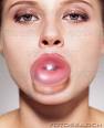 Bubble gum - A Woman popping her gum.