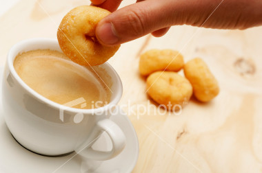 dunking mini donuts -  we dunk donuts in coffee