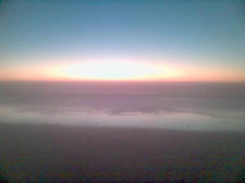 The Beach - The beach with a sunset, skyline, horizon and everything. Took it on a cell phone obviously.