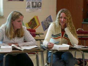 Students in Class - Students discussing their text.
