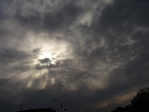 sun through the clouds - I took this image on my way to Maine for a family get together. It was cloudy and I managed to catch a glimpse of the sun peeking through.
