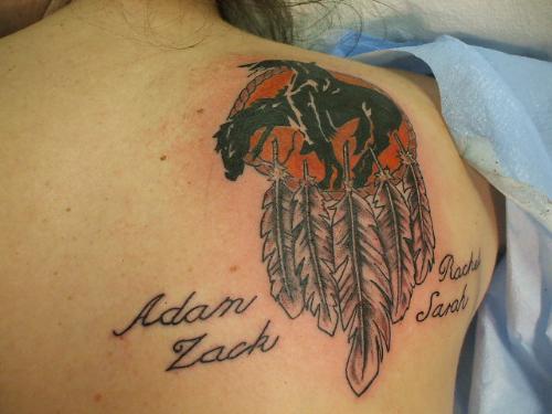 My 'End of the Trail' Dream Catcher Tattoo - This is a photo of my most recent tattoo. I got it on 6/14/07. I grew up in the town where the End of the Trail statue is, and my husband is part Native American, so that is why I chose this one. My kids names are on it too.