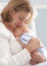 a mother with her newborn - A newborn baby needs all the attention that he/she needs. 