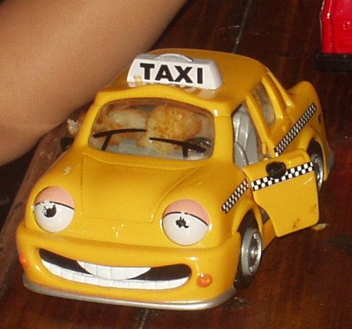 Tater Tot Taxi! - I had made some tater tots for my youngest grandson the other morning for breakfast. He loves them! Then I was sitting there watching his cartoons and I noticed him closing the door of his Chevron car taxi. So I looked a little closer and he had stuffed his last few tater tots into the front seat of his toy car. It was so cute that I had to take a picture!