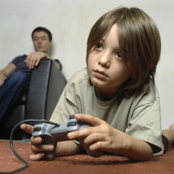 Child addicted to game? - Child playing a video game