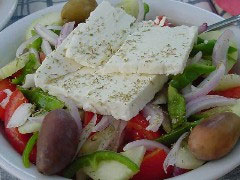 Greek Salad - We call *horiatiki salata* and mean the farmer salad.