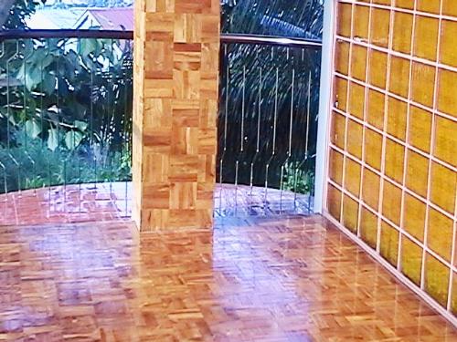 my terrace - wood tile terrace floors and posts.