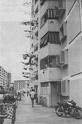 hdb flagpoles - drying laundry from high rise flats in singapore