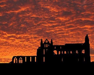 Whitby Abbey - Whitby Abbey under a red sky. Haunting! Whitby Abbey - Whitby Abbey under a red sky. Haunting!