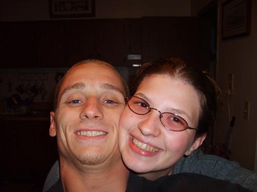 Me and my Hubby - This picture was taken at our home by us. We have been together for 5 years now. We have 2 kids. We love being with each other and our children.