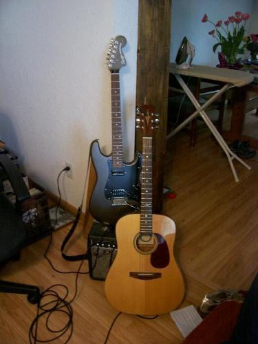 My Two Guitars - A Squier Stratocaster and Alvarez Regent Six String Acoustic.