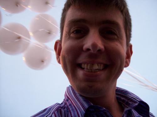 James Withers - This is a picture of myself on my way to my neice and nephew's baptism, with a handful of balloons.
