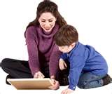 mother teaching son - I enjoy teaching my kids in their schools lesson.