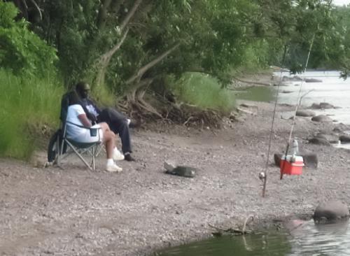 Mississippi River Fishing - One of a few couples seen along the Mississippi River near Downtown Minneapolis fishing Wed. evening.