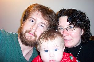 Myself with my husband and son - See, I don't mind? =p