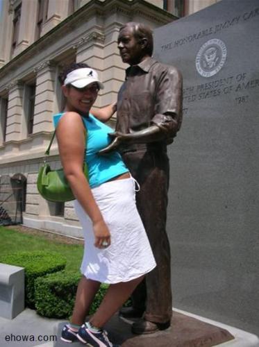 President - A tourist gets fresh with a statue