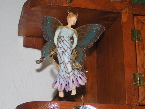 porcelain angel - This is one of the many angels in my collection. I decorate a Christmas tree with them, but some I leave out all year 'round to enjoy.