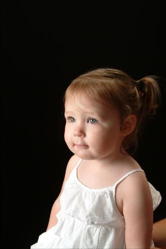 Sena - This is one of the pictures made a Portrait Innovations. This is one of my favorites. It just really captures he beautiful chubby cheek and those pretty eyes.