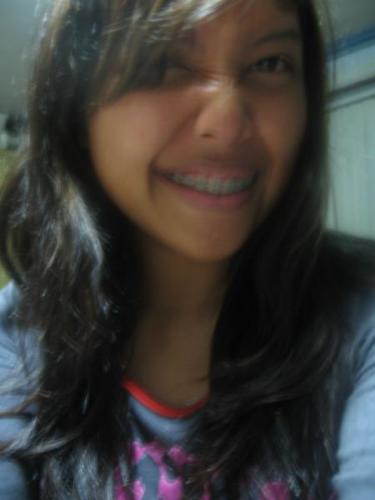 Heeh.:3 - This is the day I decided to take pictures of myself because I was bored with homework. Heeh. I as you can see, am wearing my favorite sweat shirt that my dad gave me.