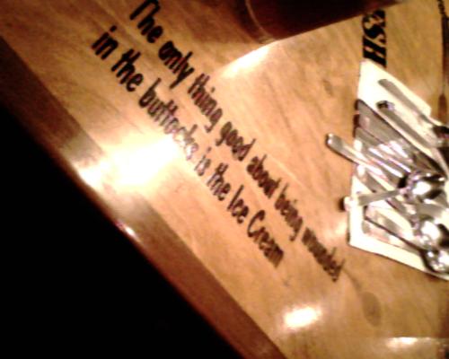 Saying on a Table - A line from Forrest Gump on a table at Bubba Gump restaurant. Really cool place to eat.