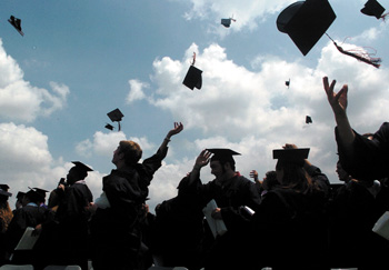 Grads Throwing their Hats - Happy Day Graduation at last!!!