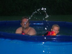Me and my son  - having a waterbattle with my wife and daughter.