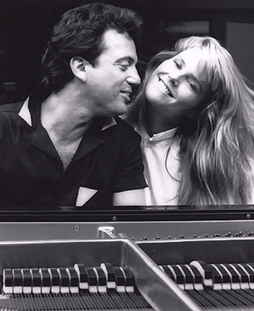 Billy Joel & Christie Brinkley - William Martin 'Billy' Joel (born May 9, 1949, in Bronx, New York, USA) is an American singer, pianist, and songwriter. He released his first hit song, 'Piano Man', in 1973. According to the RIAA, he is the seventh best selling artist in the United States. Joel had Top 10 hits in the '70s, '80s, and '90s, is a six-time Grammy Award winner and has sold in excess of 150 million records worldwide. He was inducted into the Songwriter's Hall of Fame (Class of 1992), the Rock and Roll Hall of Fame (Class of 1999), and the Long Island Music Hall of Fame (Class of 2006). Joel retired from recording pop music in 1993 but continued to tour (sometimes with Elton John). In 2001 he subsequently released Fantasies & Delusions, a CD of classical compositions for piano. In 2007 he returned to recording with a single entitled 'All My Life'.