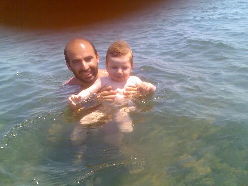 My daughter - My daughter Nehir with my husband when she is swimming.