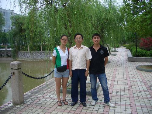Zhu Ying(previous student) ,Wang Zheng(colleague)  - next to the school river on June 10, 2007. 13:35