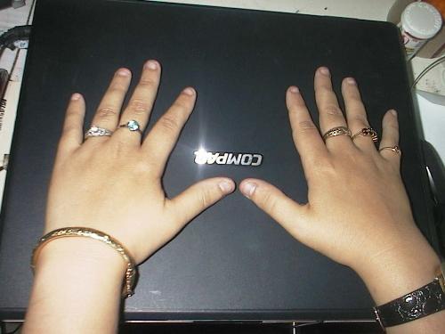 My Jewellery - My handsm with all of my favourite jewellery, including my brand new engagement ring. ;-)