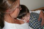 a child sleeping with mommy - Maybe it makes a child comfortable in sleeping beside his/her mother's bed..