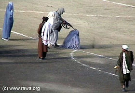 Life in Afghanistan under the Taliban. - Public execution by the Taliban of a woman known as Zarmina at the Ghazi Sports Stadium, Kabul.