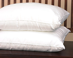 Feather Pillows - This is a picture of two feather pillows, much like the ones that I sleep with. In my opinion feather pillows and the most confortable pillows. Feather Pillows - This is a picture of two feather pillows, much like the ones that I sleep with. In my opinion feather pillows and the most confortable pillows.