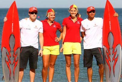 Alonso and Hamilton - Mclaren teammates Fernando Alonso and Lewis Hamilton pose in true Baywatch with woman dressed as life savers on St Kilda Beach during a Vodafone promtional event ahead of the Australian Formula one Grand Prix in Melbourne