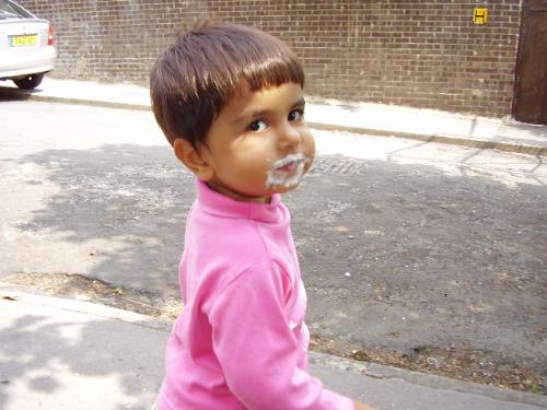creamy moustache - my 19 months daughter outside our home