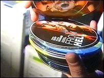 Pirated DVDs - Pirated DVDs in hand