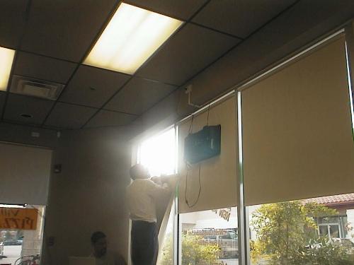 His Good Deed For The Day! - When one of the blinds at the cafe fell from the window, my fiance was the first to lend a hand, putting it back in it's proper place.