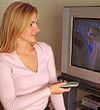 She is just kiling the screen of her Television - Oh! I have lots of clicks to be made in ptc's and ptr sites, Enough..watching T.V