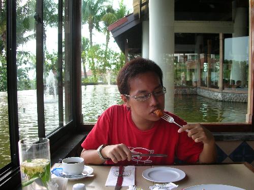 having breakfast - enjoying breakfast at Kopi O